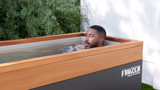 Man Outdoors, Submerged In A Cold Plunge By Medical Saunas